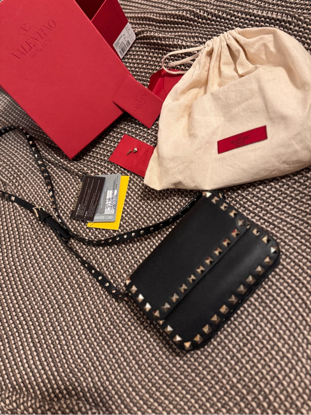 Valentino Garavani Black Leather Crossbody with Gold Pyramid Studs